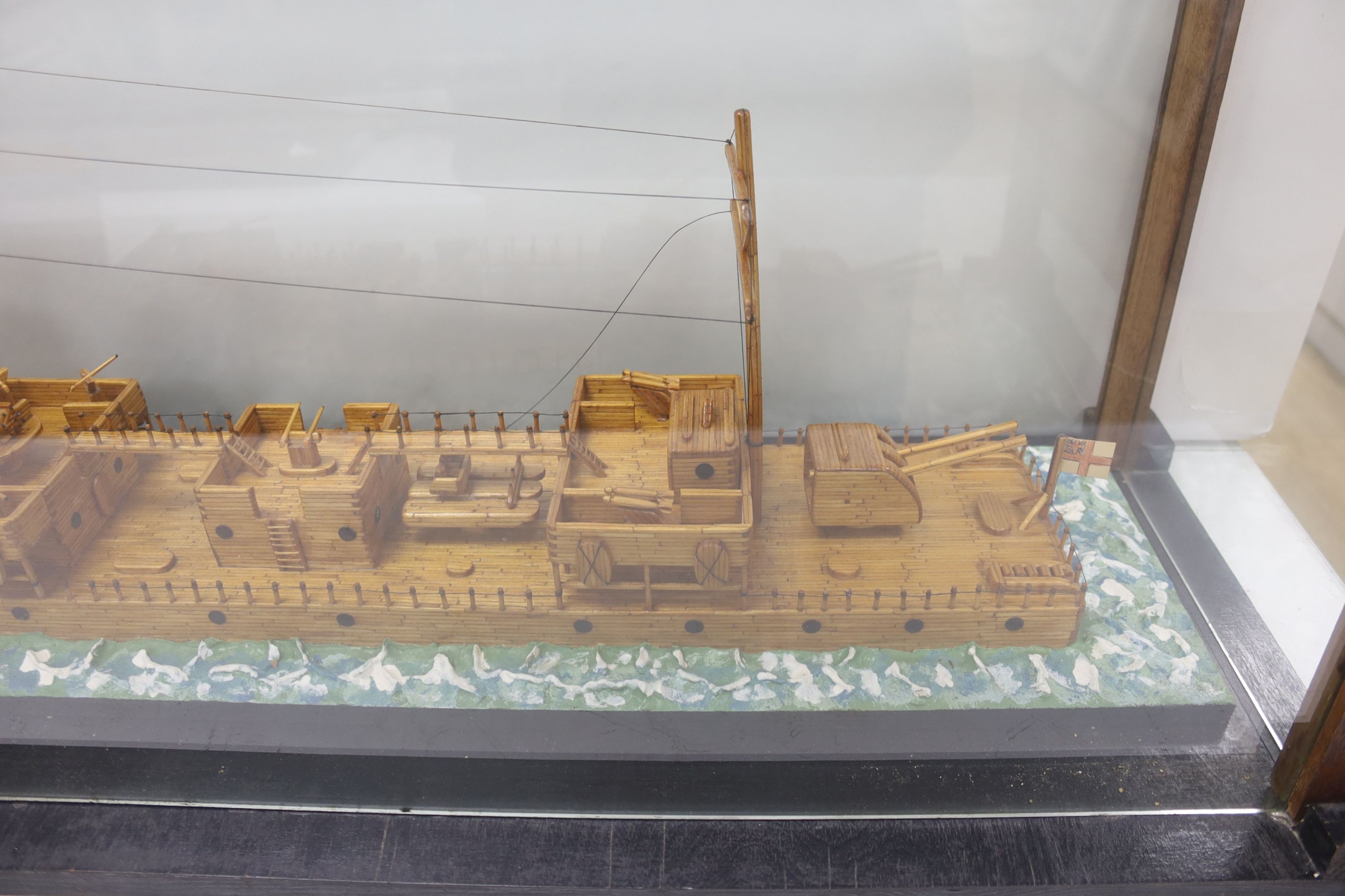 A large scratch built model of the destroyer HMS Consort (D76) made entirely out of matches, cased, 159cm total length